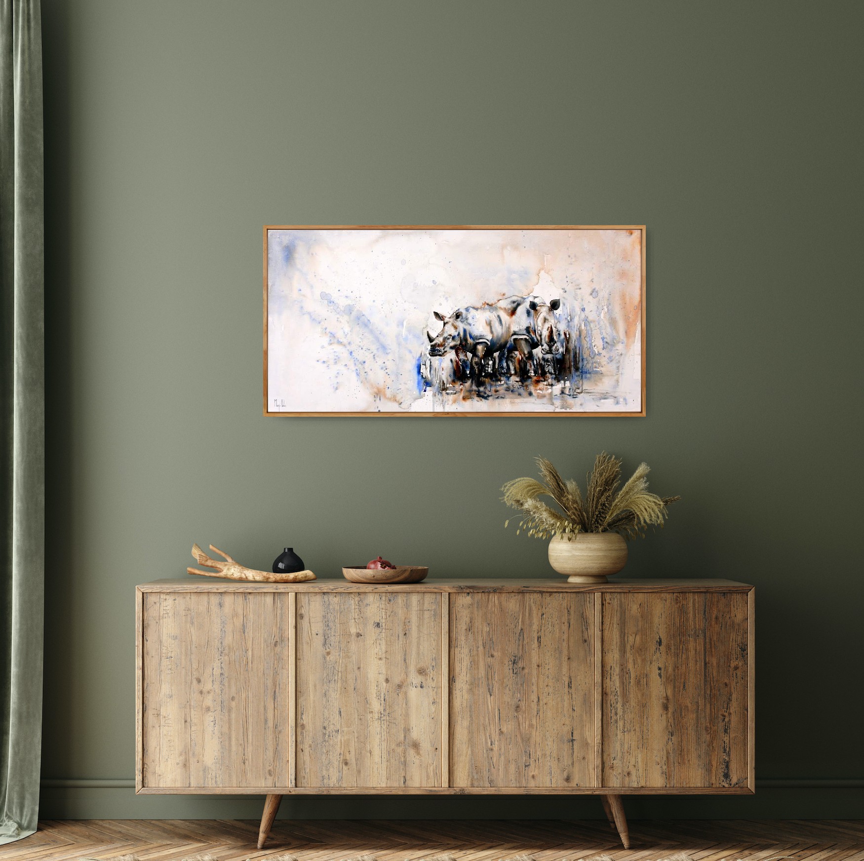 Rhino herd painting over a rustic sideboard